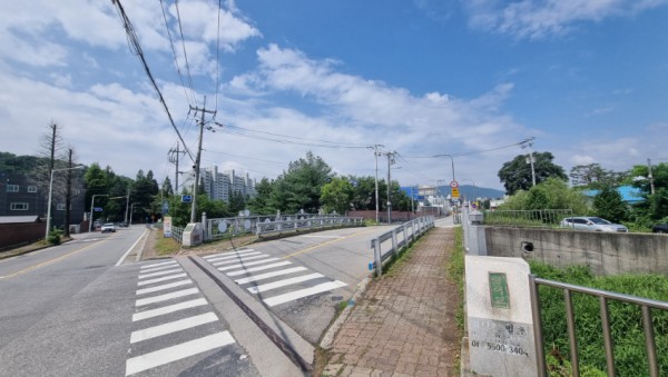 3. 용인특례시는 처인구 포곡읍 금어리 일원의 도시계획도로 중1-50호 금어교의 2차선 도로를 4차선으로 확장하는 공사를 14일 착공했다고 밝혔다.jpg